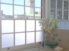 Window film can be used in bathrooms and kitchens, for privacy. Or alternatively, ornate frosted glass in older houses look good. 