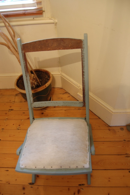 I cut squares of wool felt to cover the seat