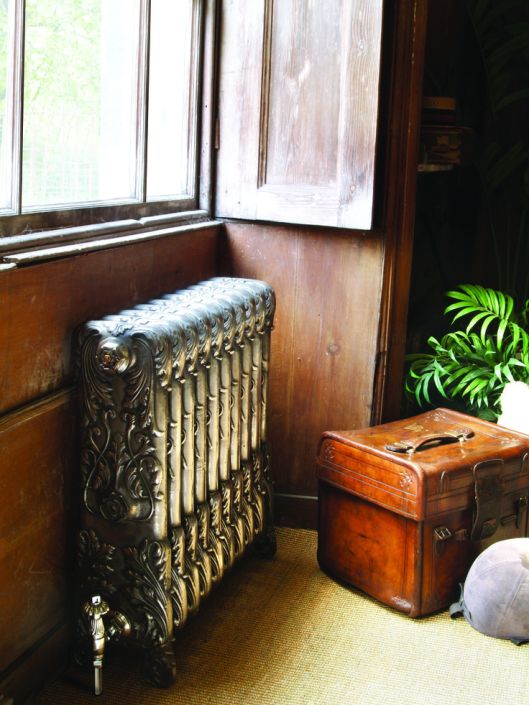 Polished Rococo patterned cast-iron radiator with decorative valve will enhance a period room. Photo from Ribble Reclamations 